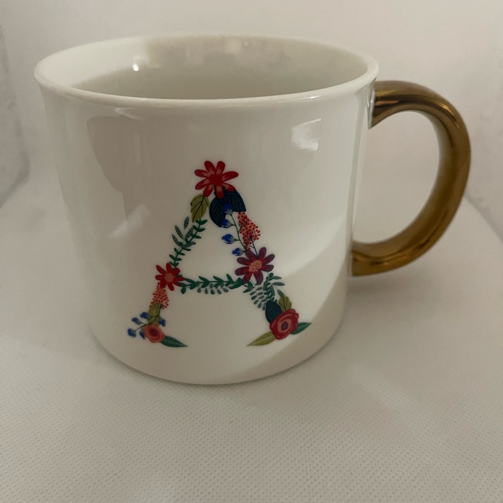 Opal house floral, and gold mine with the initial A
